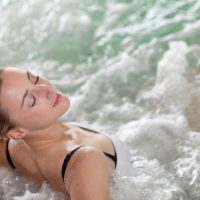 Portrait of beautiful woman in spa jacuzzi